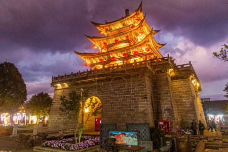 Photo for DALI, CHINA  - NOVEMBER 11, 2019: Evening view of Wuhua tower in Dali ancient city, Yunnan province, China - Royalty Free Image