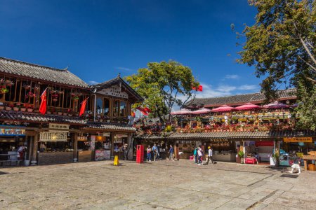 Photo for LIJIANG, CHINA  - NOVEMBER 8, 2019: Cobbled square in the old town of Lijiang, Yunnan province, China - Royalty Free Image