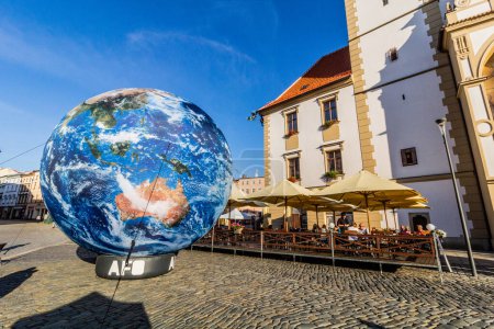 Photo for OLOMOUC, CZECHIA - SEPTEMBER 10, 2021: Model of the planet Earth on the Horni namesti square in Olomouc, Czech Republic - Royalty Free Image