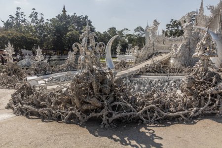 Photo for Bridge of "the cycle of rebirth" at Wat Rong Khun (White Temple) in Chiang Rai province, Thailand - Royalty Free Image