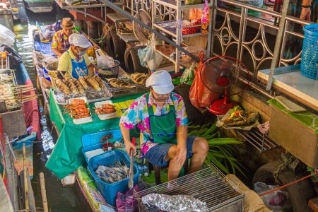 Photo for BANGKOK, THAILAND - DECEMBER 14, 2019: Cooking boat at Taling Chan floating market in Bangkok, Thailand - Royalty Free Image