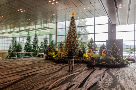Photo for SINGAPORE, SINGAPORE - DECEMBER 16, 2019: Christmas tree at Singapore Changi Airport - Royalty Free Image