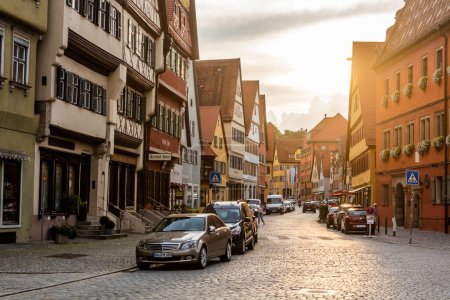 Photo for DINKELSBUHL, GERMANY - AUGUST 29, 2019: Sunset in the old town of Dinkelsbuhl, Bavaria state, Germany - Royalty Free Image