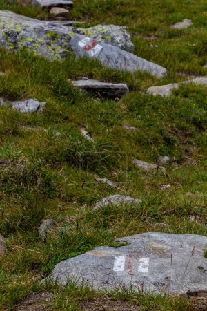Photo for Hiking markers on a rock in Rila mountains, Bulgaria - Royalty Free Image