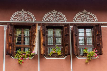 Photo for Wooden windows of an old house in Plovdiv, Bulgaria - Royalty Free Image