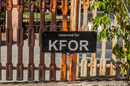 Sign Reserved for KFOR in Pristina, Kosovo