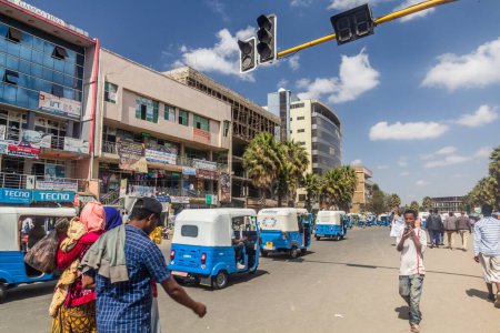 Photo for SHASHAMANE, ETHIOPIA - JANUARY 28, 2020: Traffic on the main road in Shashamane, Ethiopia - Royalty Free Image