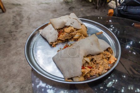 Téléchargez les photos : Repas en Ethiopie - sapin injera - en image libre de droit