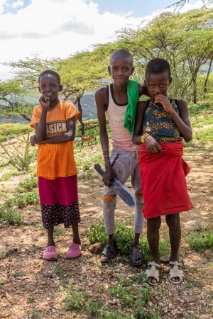 Photo for SOUTH HORR, KENYA - FEBRUARY 12, 2020: Samburu tribe children near South Horr village, Kenya - Royalty Free Image