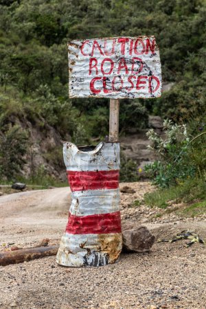 Photo for Sign caution road closed in the Hell's Gate National Park, Kenya - Royalty Free Image