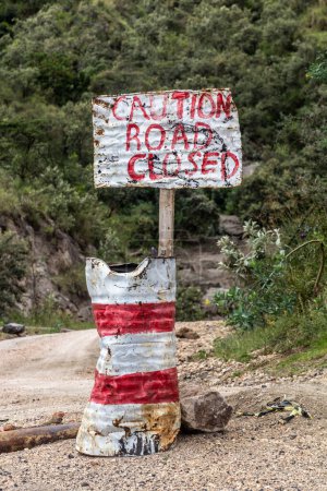 Photo for Sign caution road closed in the Hell's Gate National Park, Kenya - Royalty Free Image