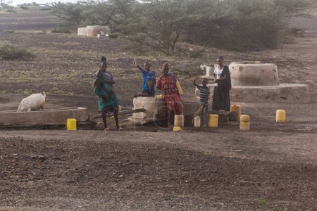 Photo for KARGI, KENYA - FEBRUARY 11, 2020: Local women in  Kargi village in northern Kenya - Royalty Free Image