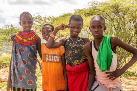 Photo for SOUTH HORR, KENYA - FEBRUARY 12, 2020: Samburu tribe children near South Horr village, Kenya - Royalty Free Image