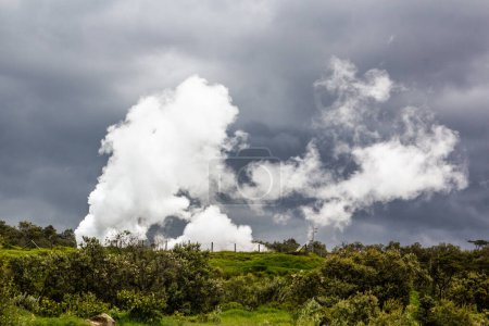 Photo for Steam rising above Olkaria Geothermal Power Station in the Hell's Gate National Park, Kenya - Royalty Free Image