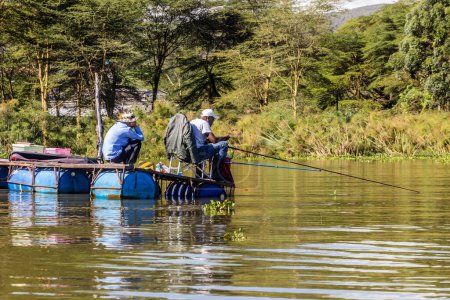 Photo for NAIVASHA, KENYA - FEBRUARY 17, 2020: Fishermen on Naivasha lake, Kenya - Royalty Free Image