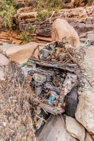 Car wreck in Wadi Lajab gorge, Saudi Arabia