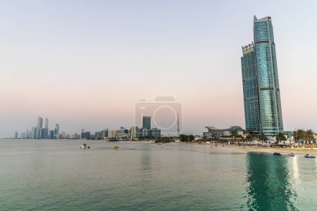 Photo for Evening view of Abu Dhabi skyline, United Arab Emirates. - Royalty Free Image