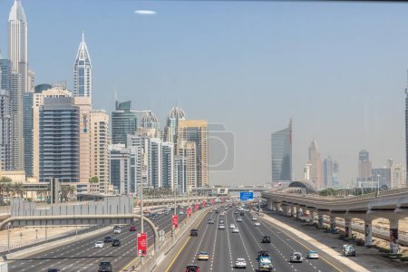 Photo for DUBAI, UAE - OCTOBER 30, 2021: Sheikh Zayed Road and the skyline of Dubai Marina, United Arab Emirates. - Royalty Free Image