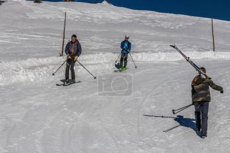 Photo for KRKONOSE, CZECH REPUBLIC - MARCH 13, 2022: Skiers at Zlate navrsi in Krkonose (Giant) mountains, Czech Republic - Royalty Free Image