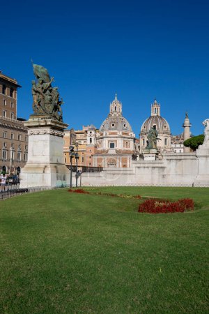 Photo for Rome, Italy - October 8, 2020: Victor Emmanuel II Monument (Monumento Nazionale a Vittorio Emanuele II) on Venetian Square and view of the domes of the churches Santa Maria di Loreto and Church of the Most Holy Name of Mary, Trajan's Column - Royalty Free Image