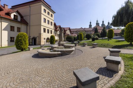 Photo for Kalwaria Zebrzydowska, Poland - August 18, 2022: Courtyard in front of Pilgrim's House and 17th century Passion and Marian sanctuary - Royalty Free Image