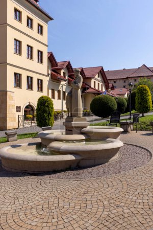 Photo for Kalwaria Zebrzydowska, Poland - August 18, 2022: Courtyard in front of Pilgrim's House and 17th century Passion and Marian sanctuary - Royalty Free Image
