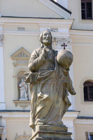 Photo for Kalwaria Zebrzydowska, Poland - August 12, 2018: Christ statue on Paradise Square in front of 17th century Passion and Marian sanctuary of Bernardine Fathers - Royalty Free Image