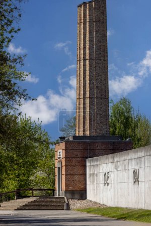 Photo for Lodz, Poland - May 4,2023: Radegast train station,  Memorial site for deported Jews to German Nazi concentration camps from Lodz ghetto (Litzmannstadt Ghetto). Symbolic crematorium chimney - Royalty Free Image