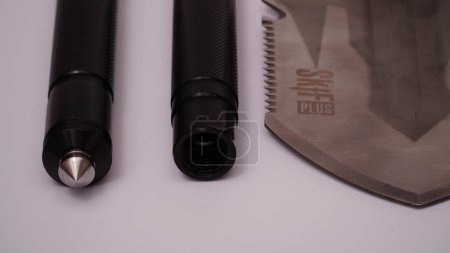 Photo for Photo of the Military Essentials Kit, Knife, Emergency Glass Breaker and Shovel - Royalty Free Image