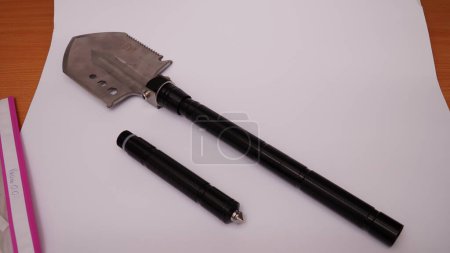 Photo for Photo of the Military Essentials Kit, Emergency Glass Breaker and Shovel - Royalty Free Image