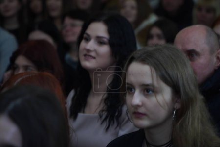 Photo for Lutsk, Ukraine: girls in award student ceremony on March 8 in Volyn Professional College of the National University of Food Technologies - Royalty Free Image