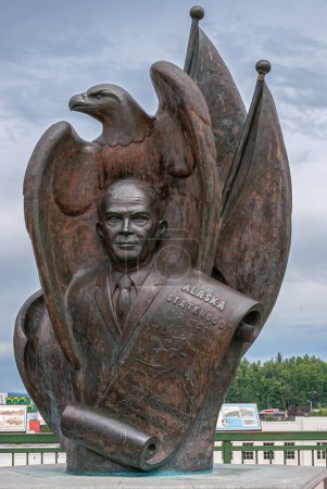 Photo for Anchorage, Alaska, USA - July 23, 2011: Closeup, President Dwight Eisenhower Statehood monument on corner of Quiyana Park. Blue cloudscape and green foliage as backdrop - Royalty Free Image
