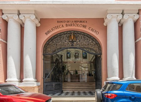 Photo for Cartagena, Colombia - July 25, 2023: Calle de la Inquisicion, monumental entrance to Banco de la Republica, historical the Biblioteca Bartolome Calvo. Columns, wrought, iron, - Royalty Free Image