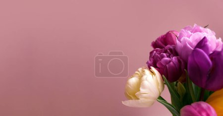 Photo for Bouquet of colorful tulip flowers on the pastel background. Mother day. Floral background. Holiday postcard mockup. Soft selective focus. Space for text. Banner. Copy space - Royalty Free Image