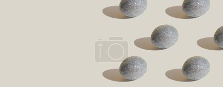 Photo for Glitter silver eggs on gray background. Minimal Easter background. Easter concept. Greeting card. Space for text. Banner - Royalty Free Image