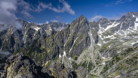 Photo for An outstanding mountain landscape of the High Tatras. A view from the Lomnicka Pass to the Little Cold Valley. Mala Studena Dolina, Slovakia. - Royalty Free Image