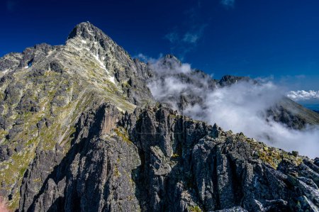 Photo for An outstanding mountain landscape of the High Tatras. A view from the Lomnicka Pass to the Lomnicky Peak (Lomnicky Stit), Slovakia. - Royalty Free Image