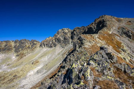 Photo for The Mount Hruby Wierch and Furkot. Autumn landscape of the High Tatras. One of the most popular travel destination in Poland and Slovakia. Sunny October day in the mountains. - Royalty Free Image