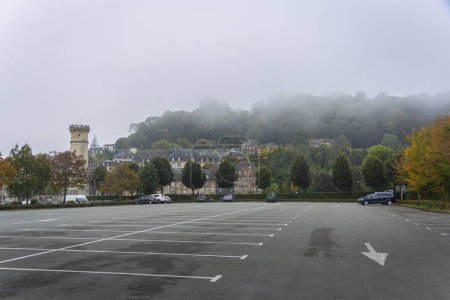 Photo for View of car park and lighthouse n the town of Honfleur, Normandy, France - Royalty Free Image
