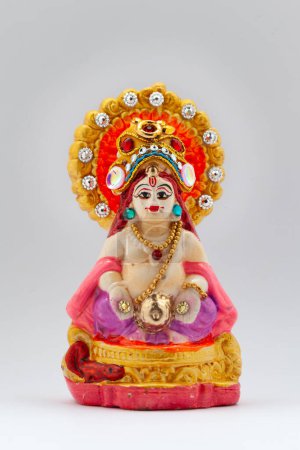 Colorful decorative Indian Hindu Lord Kuber in Diwali. Isolated on a white background.