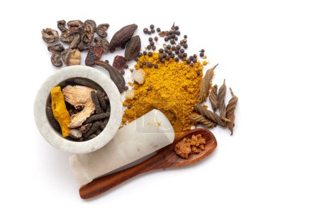 Top view of Organic digestive powder called "Buknu" with its raw spices ingredients, Isolated on a white background.