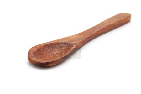 Front view of an empty wooden spoon. Isolated on a white background.