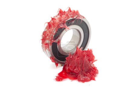 Two tapered roller bearings with red lithium grease (Machinery Lubrication). Isolated on a white background. Front view.
