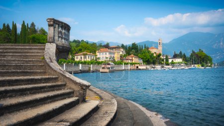 Photo for Tremezzo Tremezzina in Lake Como district. Italian lake village, lakefront and stairs view. Lombardia region, Como province, Italy, Europe. - Royalty Free Image