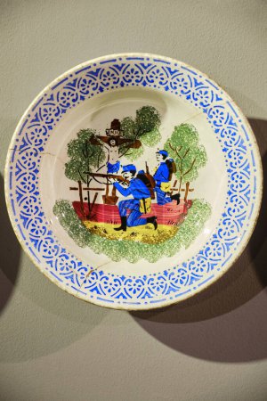 Photo for Lviv, Ukraine - November 10, 2021: Painted plate. Ukrainian handmade earthenware utensil. Souvenirs From Ukraine in ethnic style. - Royalty Free Image