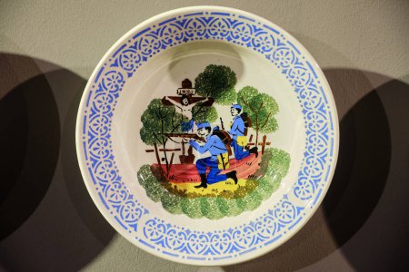 Photo for Lviv, Ukraine - November 10, 2021: Painted plate. Ukrainian handmade earthenware utensil. Souvenirs From Ukraine in ethnic style. - Royalty Free Image