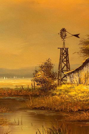 Téléchargez les photos : Détail de peinture à l'huile de paysage vintage représentant une scène de campagne avec une maison de grange délabrée et un moulin à vent au coucher du soleil. Art sud-ouest américain. - en image libre de droit