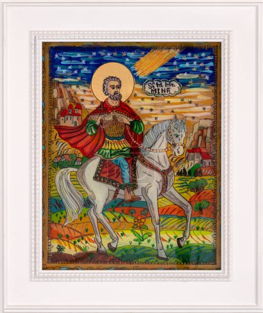 Téléchargez les photos : Icône peinte au verso dans le style naïf orthodoxe de l'Europe de l'Est représentant Sainte Mina d'Egypte. Icône encadrée. - en image libre de droit