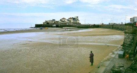 Photo for Weston-Super-mare - 14th May 2021:Tide slowing coming in - Royalty Free Image