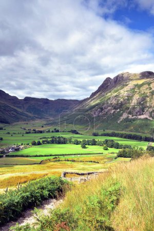 Photo for Sunlight on the Langdale Pikes and Valley - Royalty Free Image